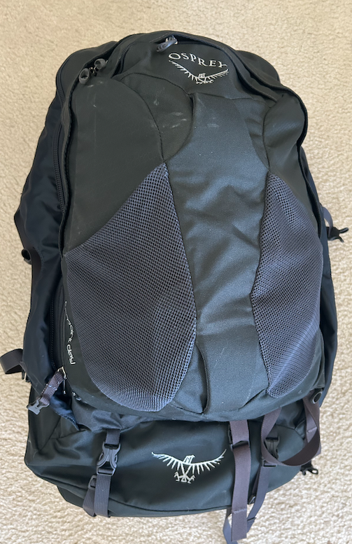 This Osprey 65L pack has served me well. It comes with a detachable small backpack.